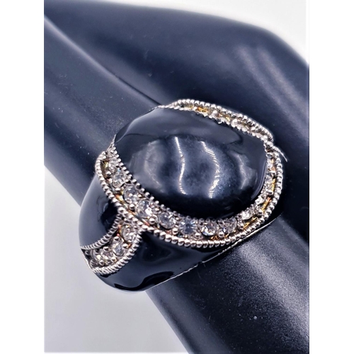 685 - RHODIUM PLATED BLACK STONED RING With CUBIC ZIRCONIA And CRYSTAL DECORATION By French Designer Camil... 