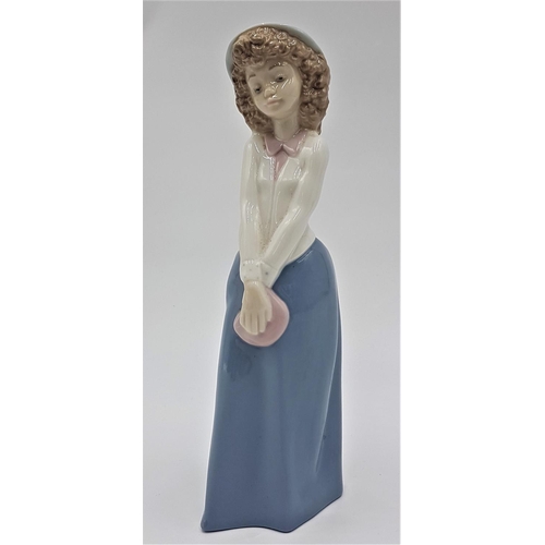 713 - LLADRO (Nao) PORCELAIN Large 24cm CHARACTER FIGURINE OF A YOUNG GIRL WITH HAT AND HOLDING A PINK PUR... 