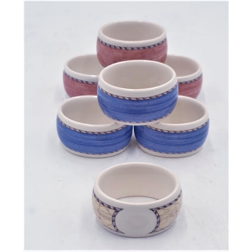 177 - WEDGWOOD CHINA NAPKIN RINGS (7) IN THE SARAH'S GARDEN DESIGN