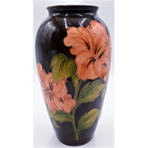 128 - MOORCROFT Extra Large 44cm VASE IN THE HIBISCUS DESIGN ON DARK GREEN GROUND Signed