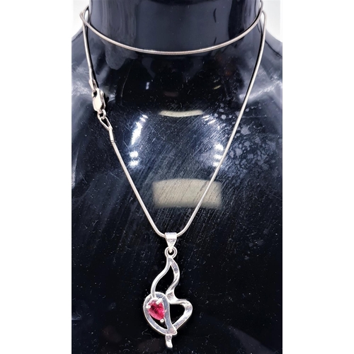 770 - SILVER (925) STONE SET HEART SHAPED PENDANT ON A SILVER 40 cm NECK CHAIN  (Boxed)