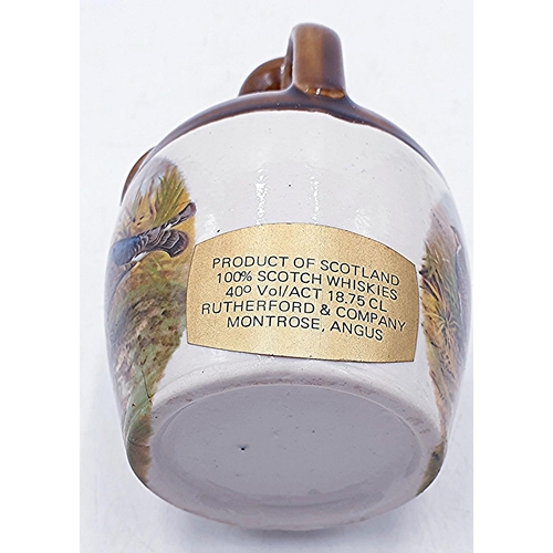 20 - RUTHERFORDS 18.5 cl 12 YEAR OLD WHISKY In A Sealed Stoneware Flagon (40% Proof).
(Please Note This L... 