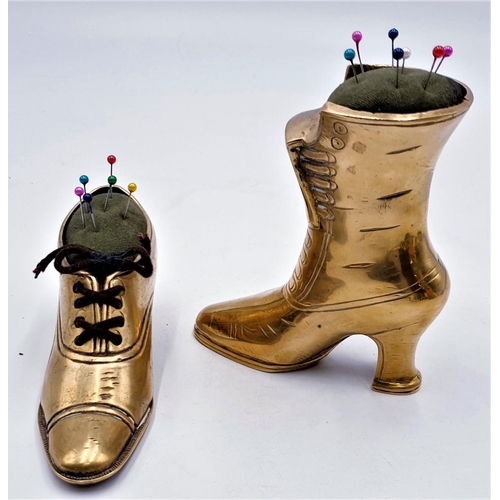 221 - SOLID BRASS PIN CUSHIONS FASHIONED A PAIR OF LADIES SHOES