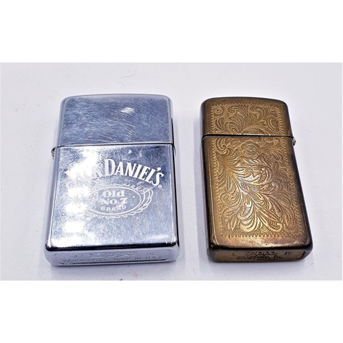 604 - ZIPPO LIGHTERS (2) JACK DANIELS Plus ONE OTHER