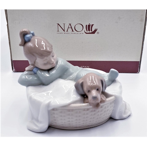 659 - LLADRO (Nao) PORCELAIN 12cm x 11cm CHARACTER FIGURINE OF A YOUNG GIRL With PUPPY 