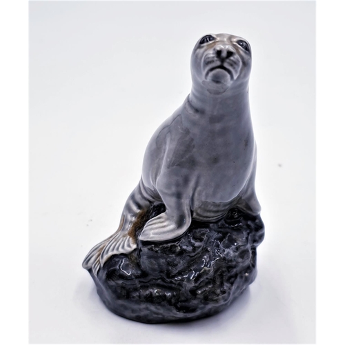 8 - BESWICK BENEAGLES 10cm SCOTCH WHISKEY FLAGON MODELLED AS A SEALION