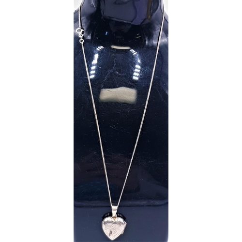 701 - SILVER (925) HEART SHAPED LOCKET ON A SILVER (925) 40cm NECK CHAIN