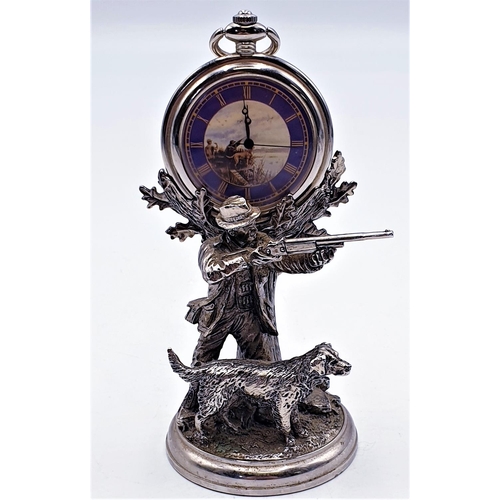 105 - POCKET WATCH ON WHITE METAL HUNTSMAN STAND