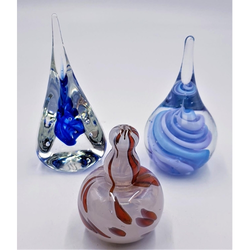 131 - COLOURED GLASS PAPERWEIGHTS (3)