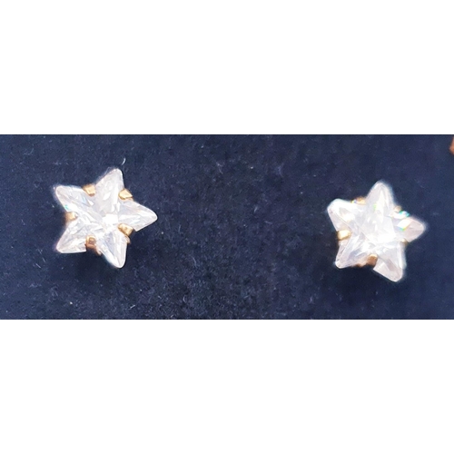 753 - PRESENTED AS A PAIR OF 9ct GOLD STAR SHAPE STUD EARRINGS (Boxed)