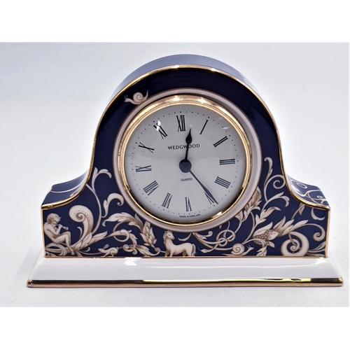 139 - WEDGWOOD CHINA 16cm x 11cm MANTLE CLOCK IN THE CORNUCOPIA DESIGN