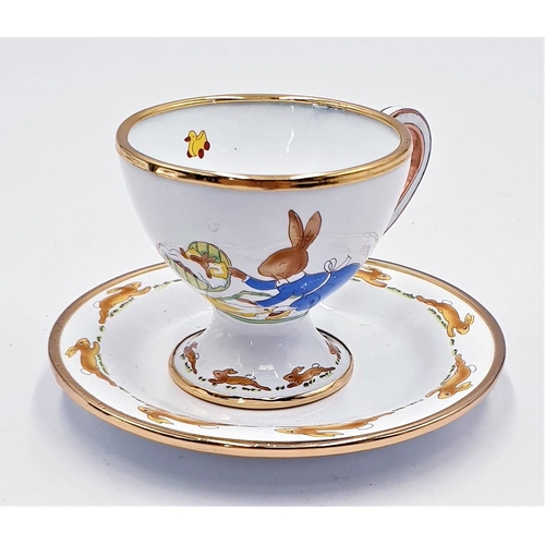 768 - ROYAL DOULTON ENAMELS BUNNYKINS TEACUP & SAUCER 'PLAYFUL'