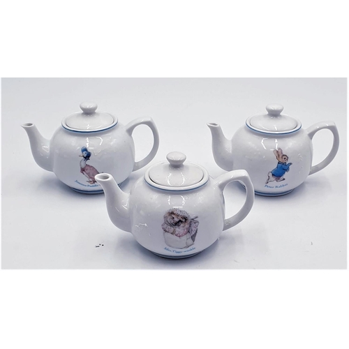 773 - CHINA BEATRIX POTTER TEAPOTS (3)