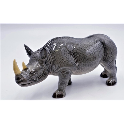 76 - H.WAIN & Sons (Melba Ware) Large 25cm x 12.5cm MODEL OF A RHINO
(Established in 1837 by Horace Wain ... 