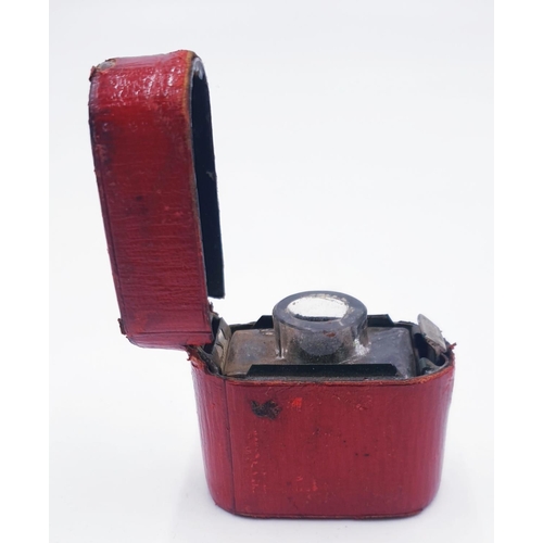 742 - MORROCAN RED LEATHER BOUND TRAVELLING INK WELL