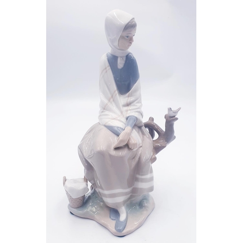 132 - LLADRO PORCELAIN Large 23.5cm CHARACTER FIGURINE OF A YOUNG LADY LOOKING DOWN AT A BIRD ON A BRANCH ... 