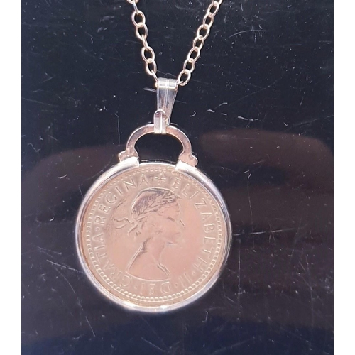 169 - 1962 SIXPENCE PENDANT ON A 46cm NECK CHAIN (Boxed)