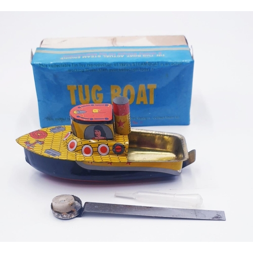 71 - CANDLE TIN PLATE MODEL OF A BOAT (Original Box)