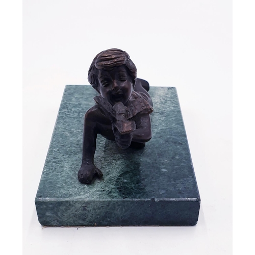 121 - SOLID BRONZE 13 cm x 8 cm (Early 20th Century) FIGURINE OF A RECUMBENT BOY HOLDING A BIRD MOUNTED ON... 