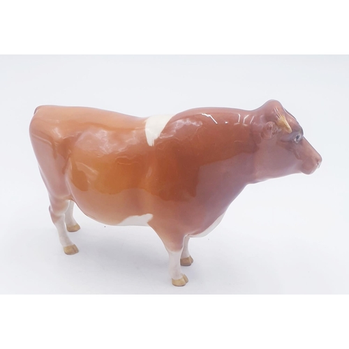 193 - BESWICK 11.9cm MODEL OF A GUERNSEY BULL 