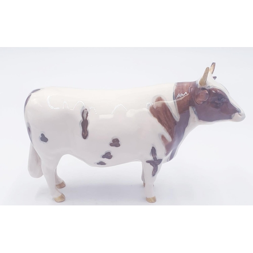 194 - BESWICK 13.3cm MODEL OF AN AYRSHIRE BULL 