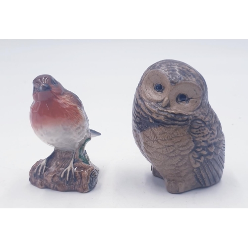 57 - POOLE POTTERY MODEL OF AN OWL TOGETHER WITH A BESWICK MODEL OF A ROBIN