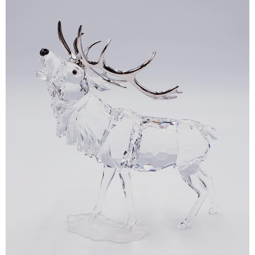 754 - SWAROVSKI CRYSTAL 13cm x 13.5cm MODEL OF A STAG (This retired Swarovski crystal stag was designed by... 