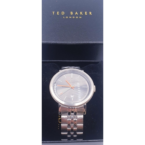 117 - TED BAKER BLUE FACE,CHROME STRAP WRIST WATCH (Found To Be Working When Photographed)  (Original Box)