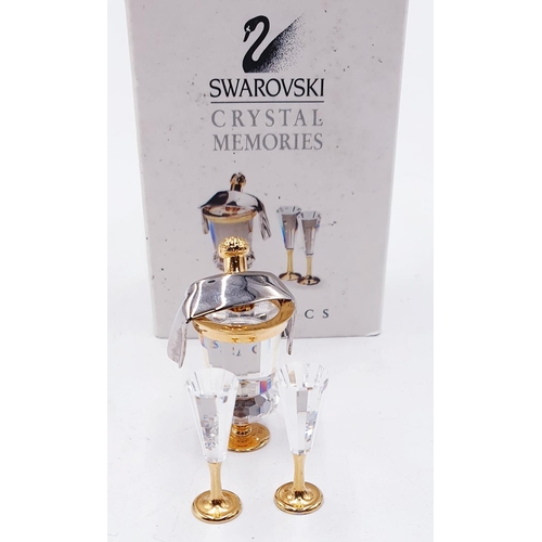 246 - SWAROVSKI CRYSTAL MEMORIES SPARKLING WINE COOLER & TWO CHAMPAGNE FLUTES (This retired Swarovski Crys... 