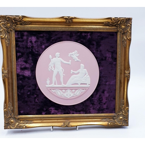 745 - WEDGWOOD PINK JASPER WARE PLAQUE MOUNTED IN A 36cm x 31cm GOLD FRAME.
(Please Note This Lot WILL NOT... 