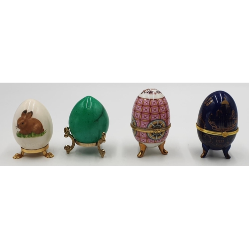 754 - PORCELAIN EGGS ON STANDS (4)