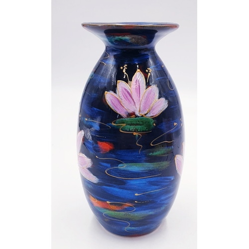 325 - ANITA HARRIS ART POTTERY 21cm MINOS VASE IN THE LOTUS FLOWER DESIGN (Signed In Gold By Anita Harris)