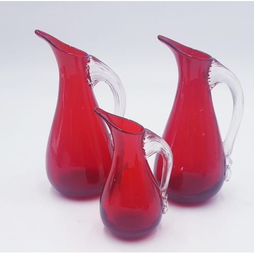 107 - WHITEFRIARS RED GLASS JUGS (3)