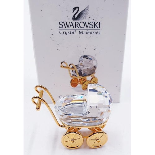 274 - SWAROVSKI CRYSTAL MEMORIES 4cm MODEL OF THE BABY CARRIAGE (This retired Swarovski Crystal Memories B... 