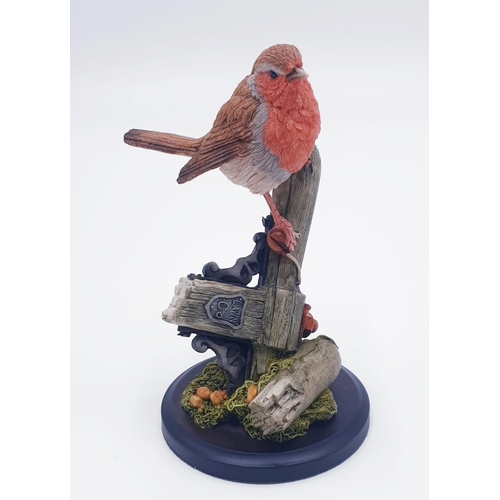 85A - COUNTRY ARTIST 15.5cm MODEL OF A ROBIN ON A GARDEN ROLLER.
(Country Artists celebrated its 20th anni... 