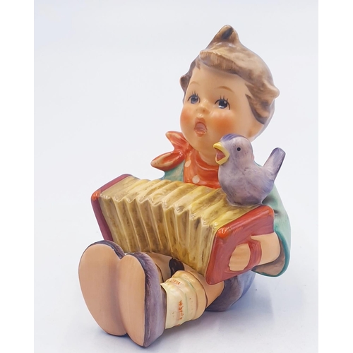 605 - GOEBEL HUMMEL 8cm CHARACTER FIGURINE OF A BOY WITH SQUEEZE BOX 'LETS SING' c1960s