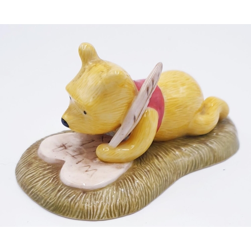 704 - ROYAL DOULTON WINNIE THE POOH FIGURINE 