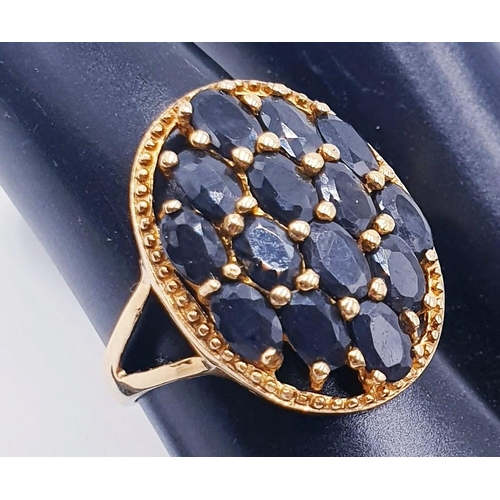 717 - GOLD ON STERLING SILVER / Large OVAL DARK BLUE STONE LADIES CLUSTER  RING  (Size Q, Total Weight 4.3... 