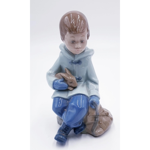 770 - LLADRO (Nao) PORCELAIN 16cm  CHARACTER FIGURINE OF A BOY WITH RABBIT And RUCKSACK