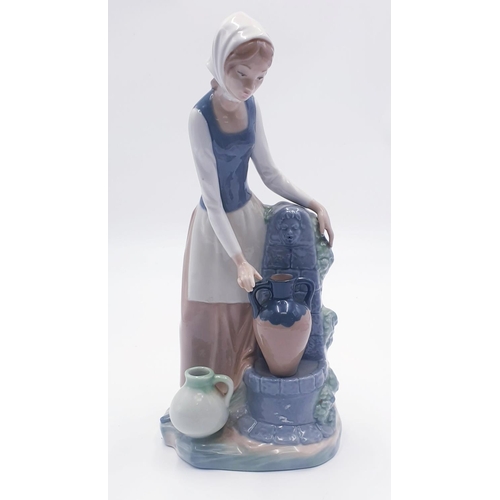 773 - LLADRO (Nao) PORCELAIN Extra Large 28cM x 14cM x 11cm CHARACTER FIGURINE OF A LADY AT THE WATER FOUN... 