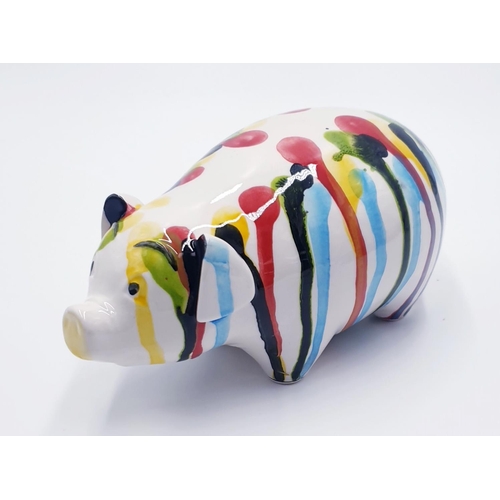 866 - ANITA HARRIS ART POTTERY 9cm x 20cm DRIP GLAZE MODEL OF A PIG (Signed In Gold By Anita Harris)