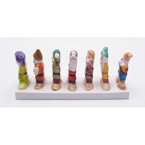 885 - CERAMIC CLOVER SEVEN DWARFS TOAST RACK