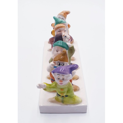 885 - CERAMIC CLOVER SEVEN DWARFS TOAST RACK