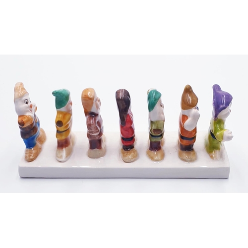 885 - CERAMIC CLOVER SEVEN DWARFS TOAST RACK