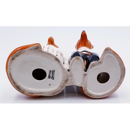 621 - CERAMIC MODEL OF MR & MRS FOX (A/F)