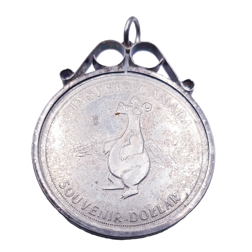 575 - JASPER 1981 SOUVINIR DOLLAR PENDANT