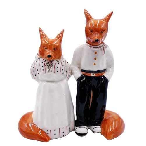 621 - CERAMIC MODEL OF MR & MRS FOX (A/F)