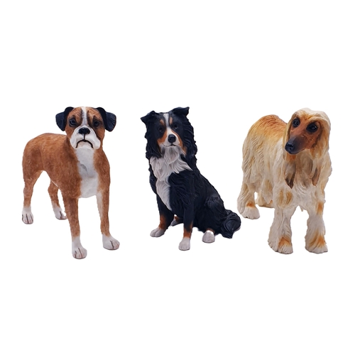 639 - RESIN MODELS OF THREE DOGS