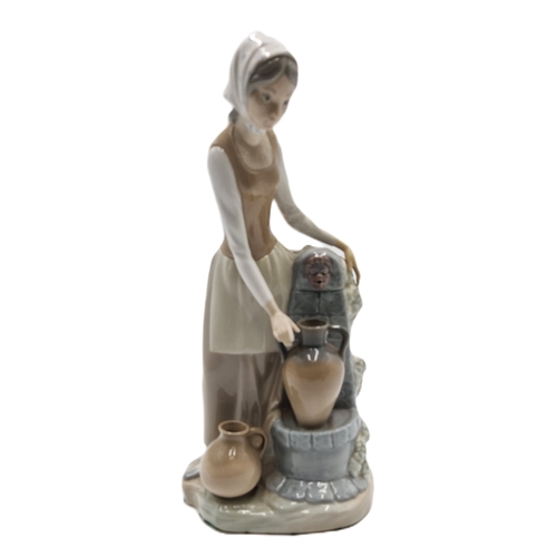 188 - LLADRO (Nao) PORCELAIN Extra Large 28cm x 14cm x 11cm CHARACTER FIGURINE OF A LADY AT THE WATER FOUN... 