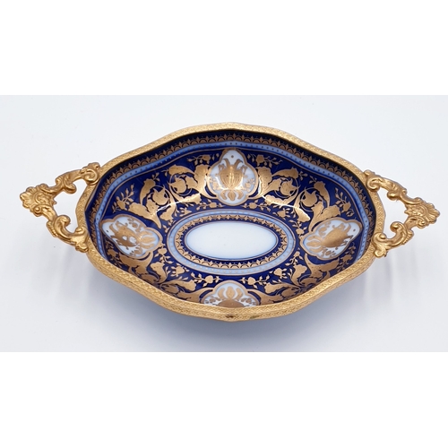 243 - PORCELAIN 16cm x 13cm DISH WITH ORMOLU MOUNT